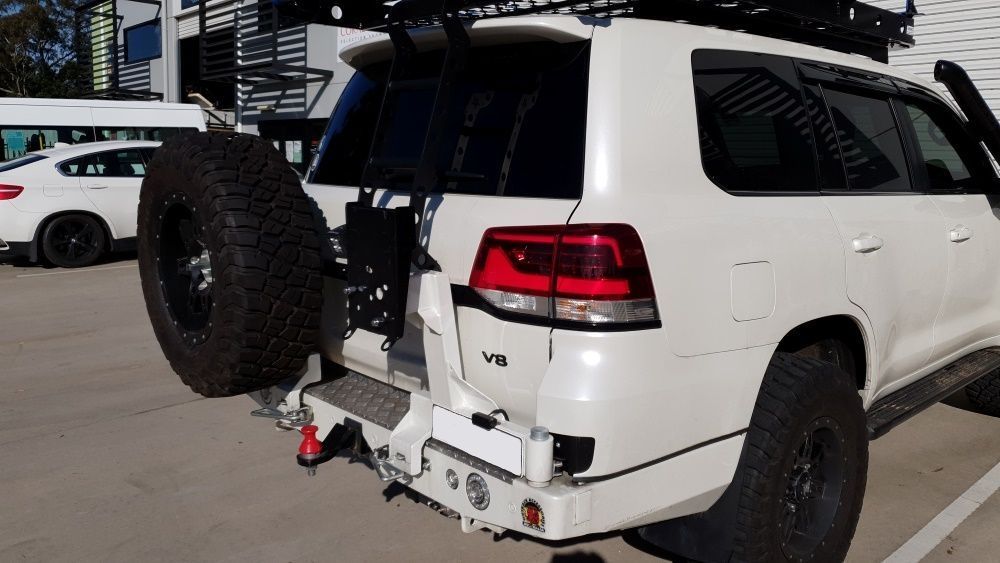 White Off-road Suv With Spare Tire On The Back — Coasteer Automotive In Tuggerah, NSW