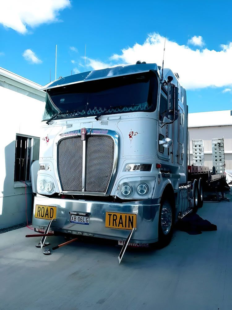 White Kenworth Truck Parked, Front View — A1 Loco's Towing in Mackay, QLD