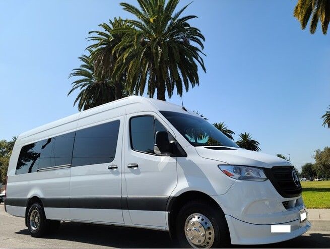 white mercedes sprinter limousine