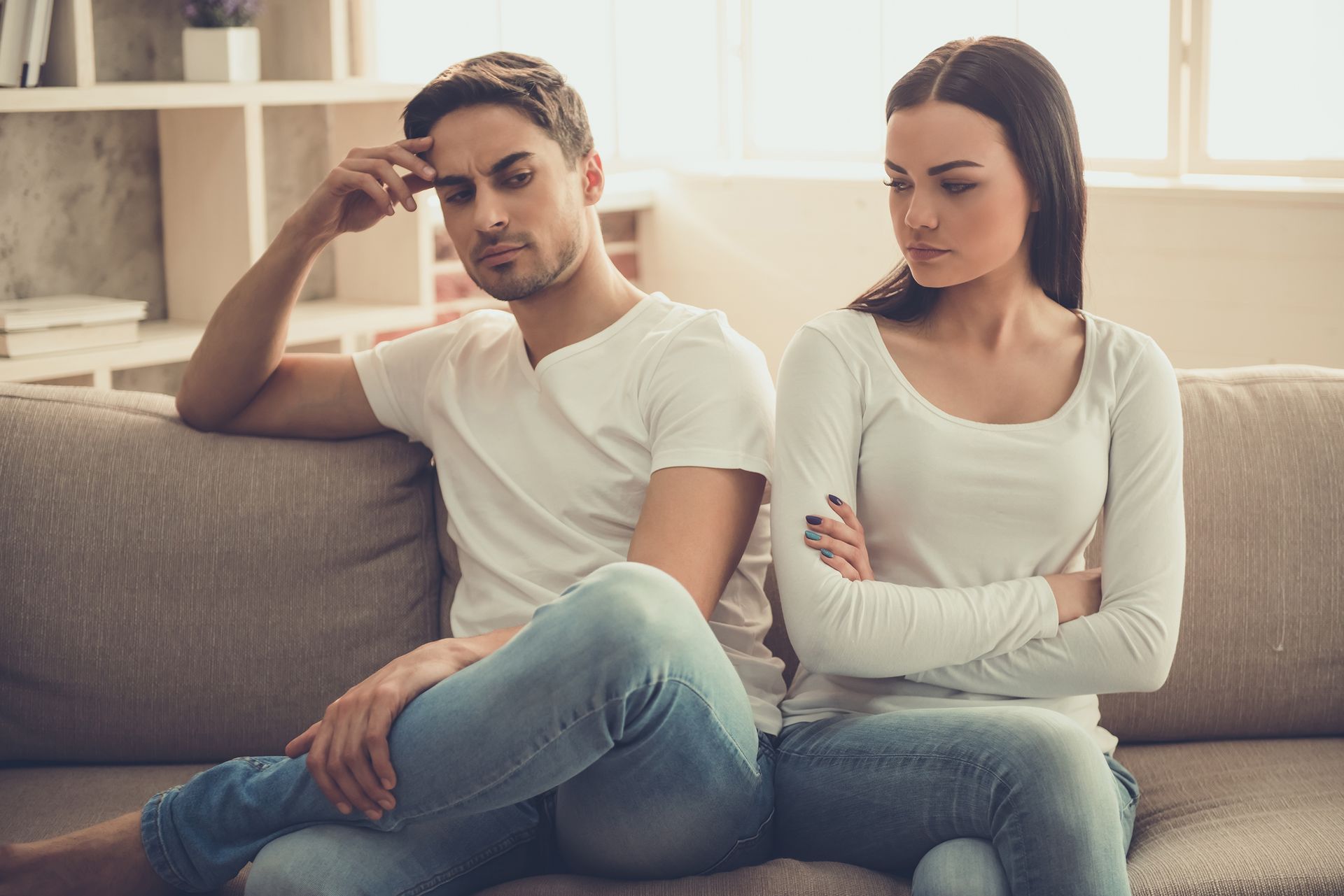 beautiful young couple having quarrel while