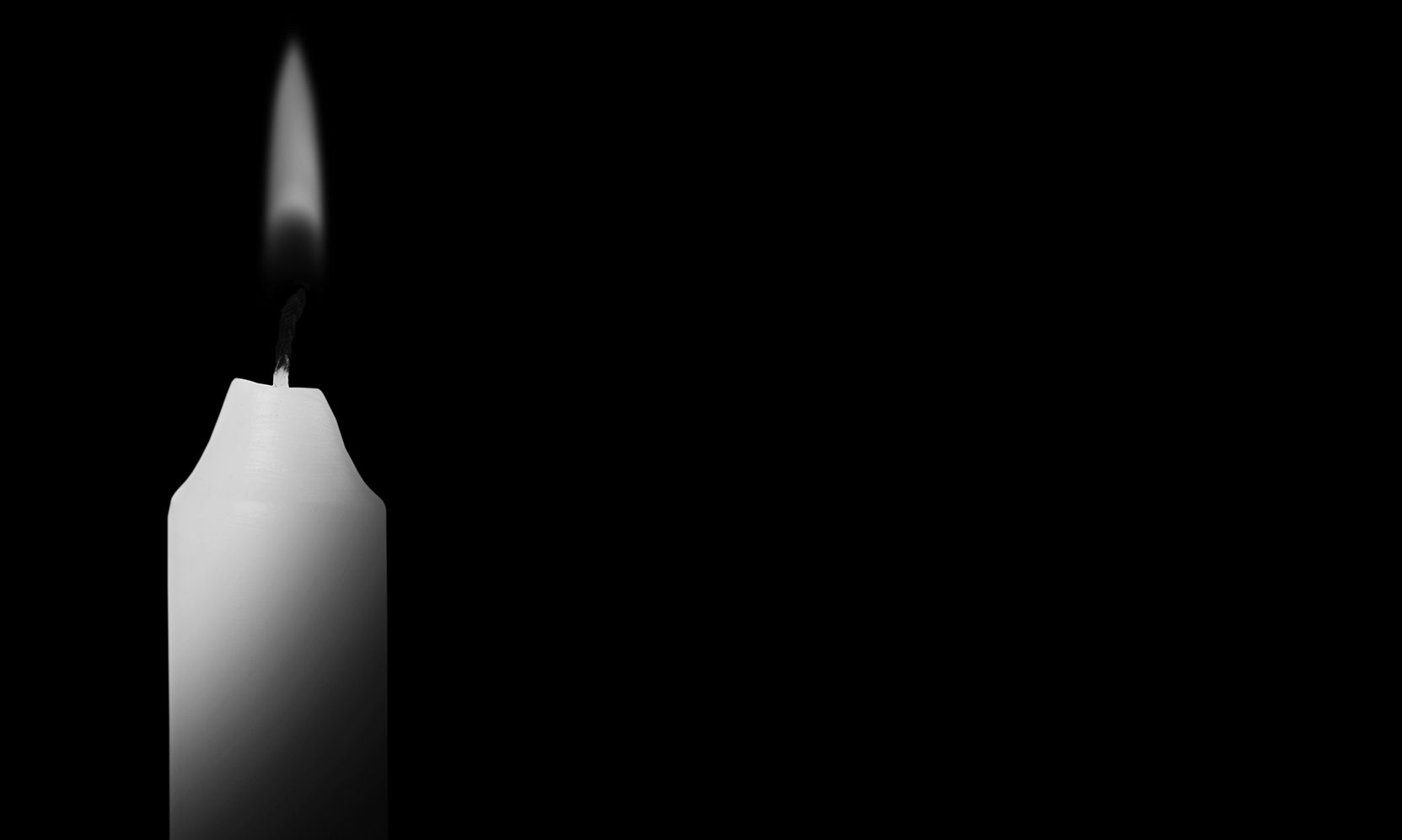 candle burning black background concept mourn