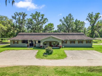 Large White House with A Brown Roof — Ocala, FL — Invictus Real Estate, LLC