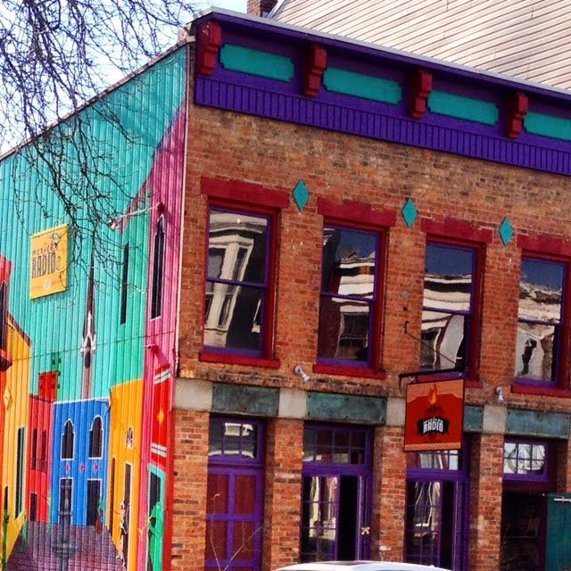 A colorful building with a sign that says 1800 on it