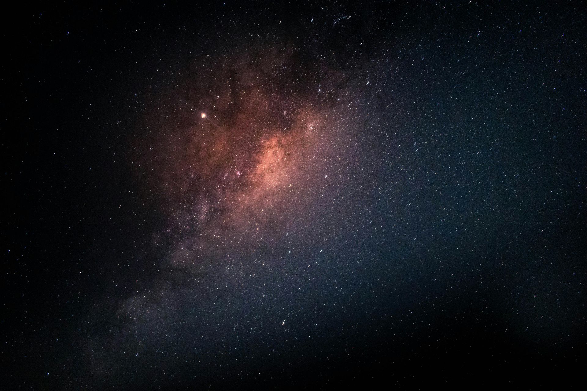 The milky way galaxy is visible in the night sky.