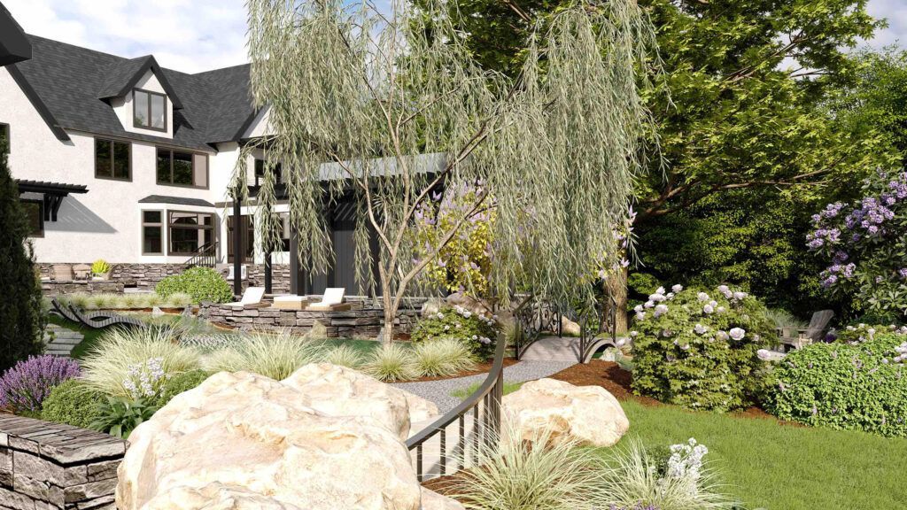 There is a large house in the background and a large rock in the foreground.