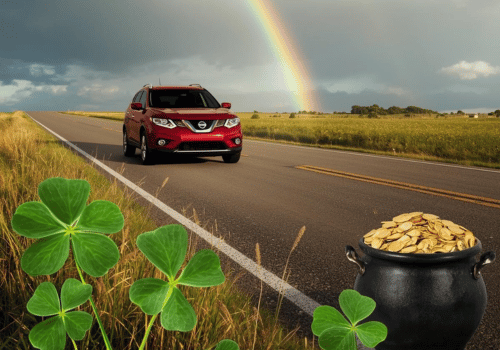 Red Nissan SUV on a rural road with a rainbow, shamrocks, and a pot of gold nearby.