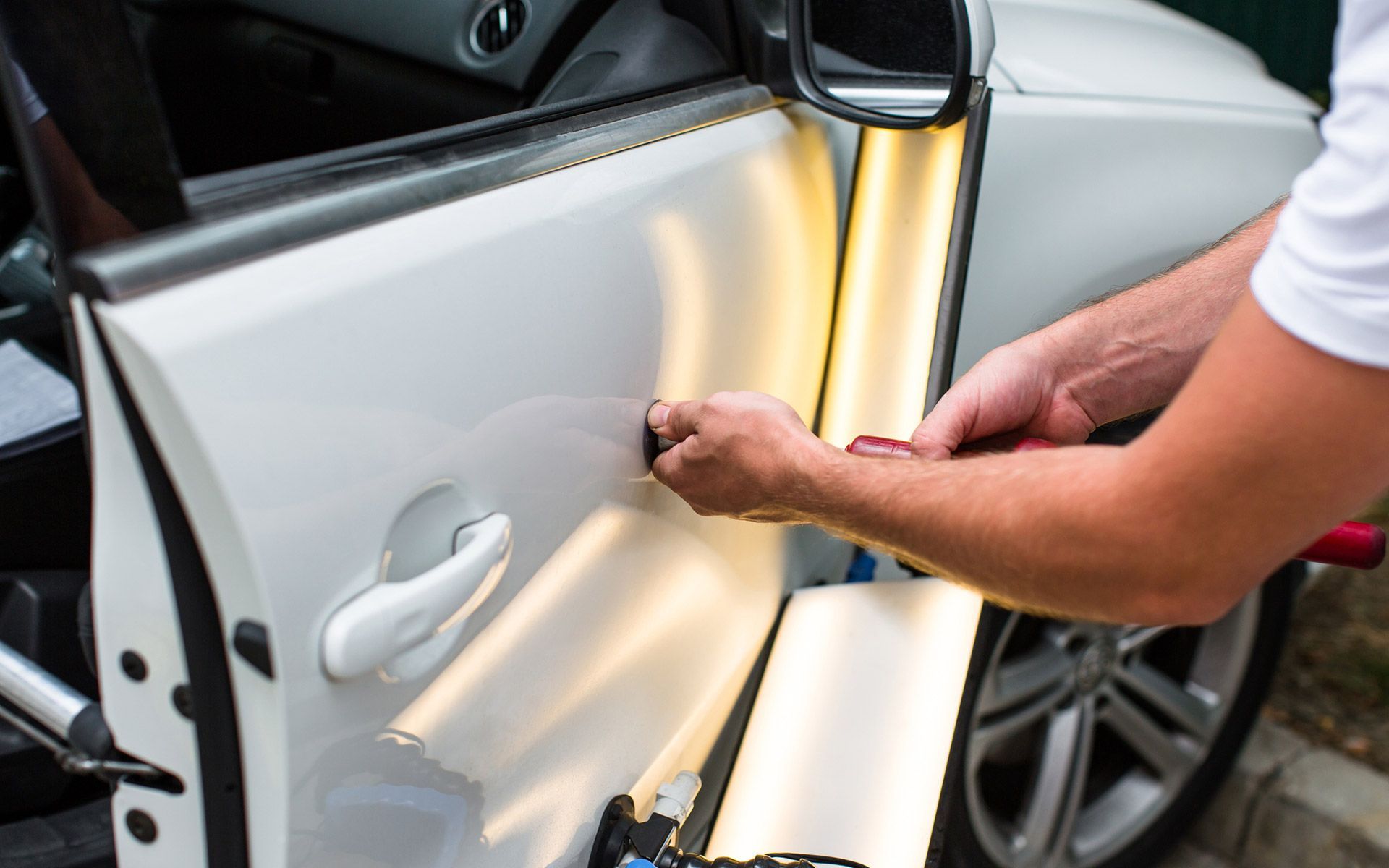 White Car — Haltom City, TX — Dent Mechanix