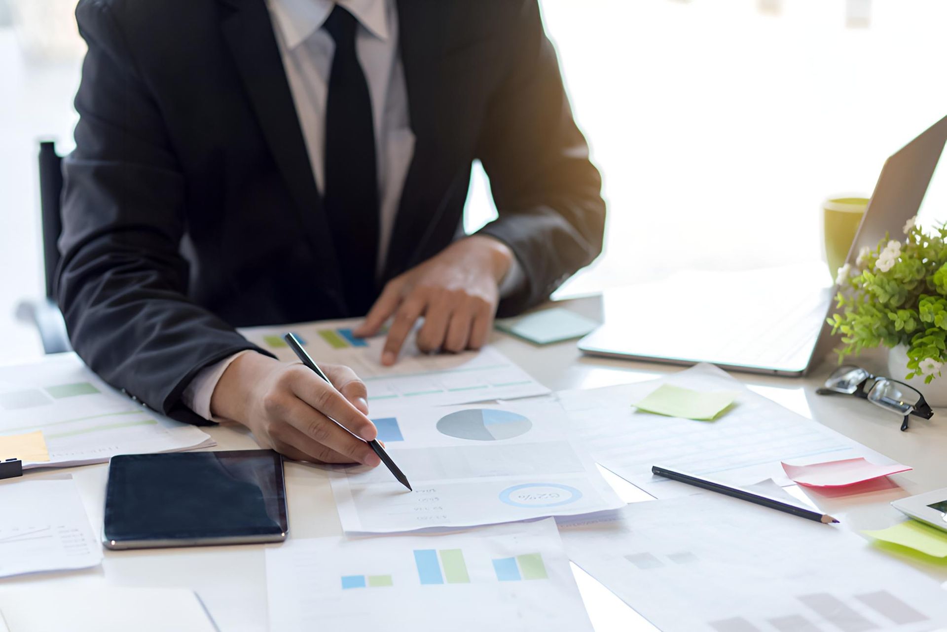 Man is Computing Payroll — Darling Downs Bookkeeping Company in Warwick, QLD