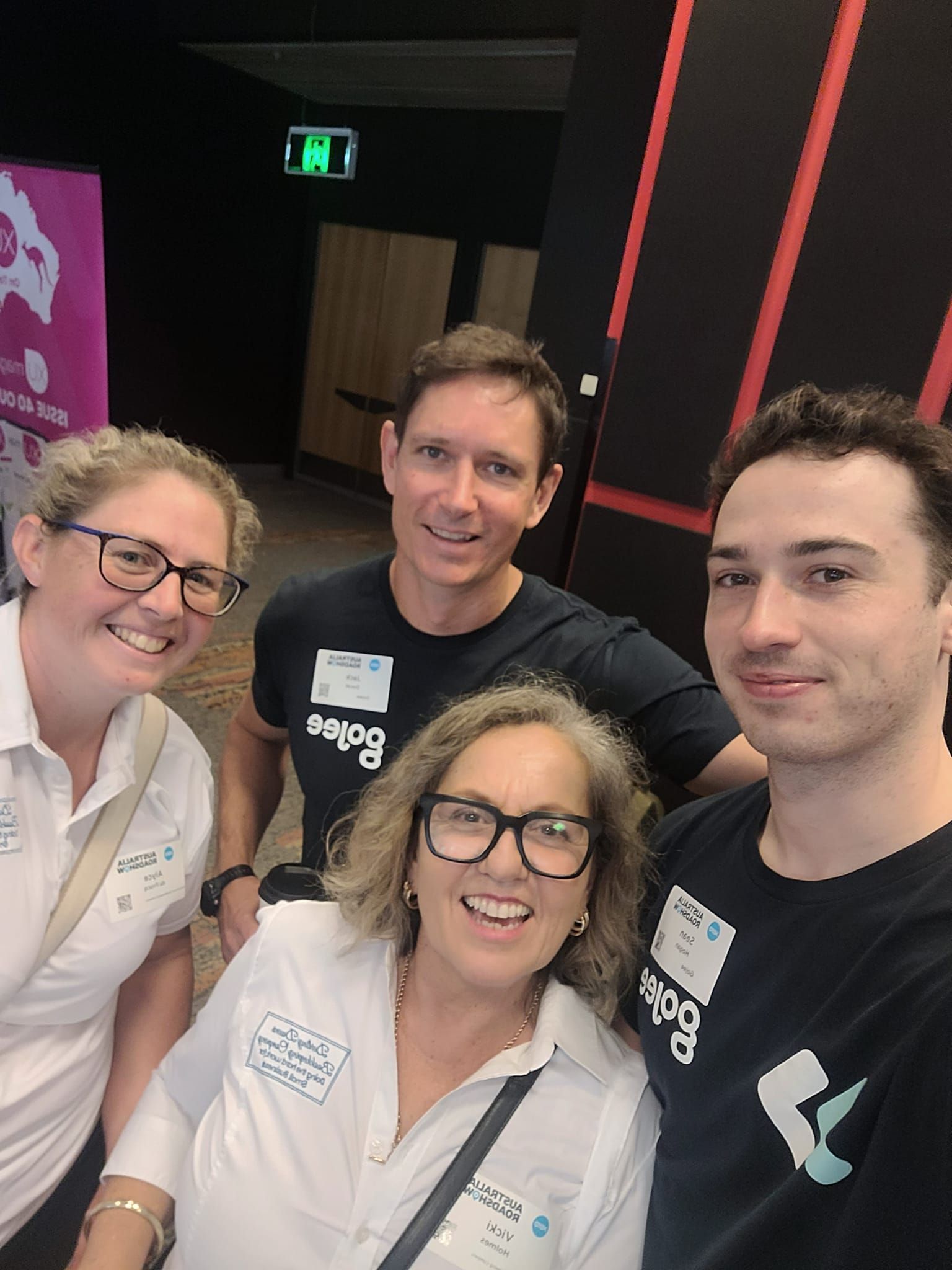 Man in a Suit is Writing on a Piece of Paper While Using a Calculator — Darling Downs Bookkeeping Company in Toowoomba City, QLD