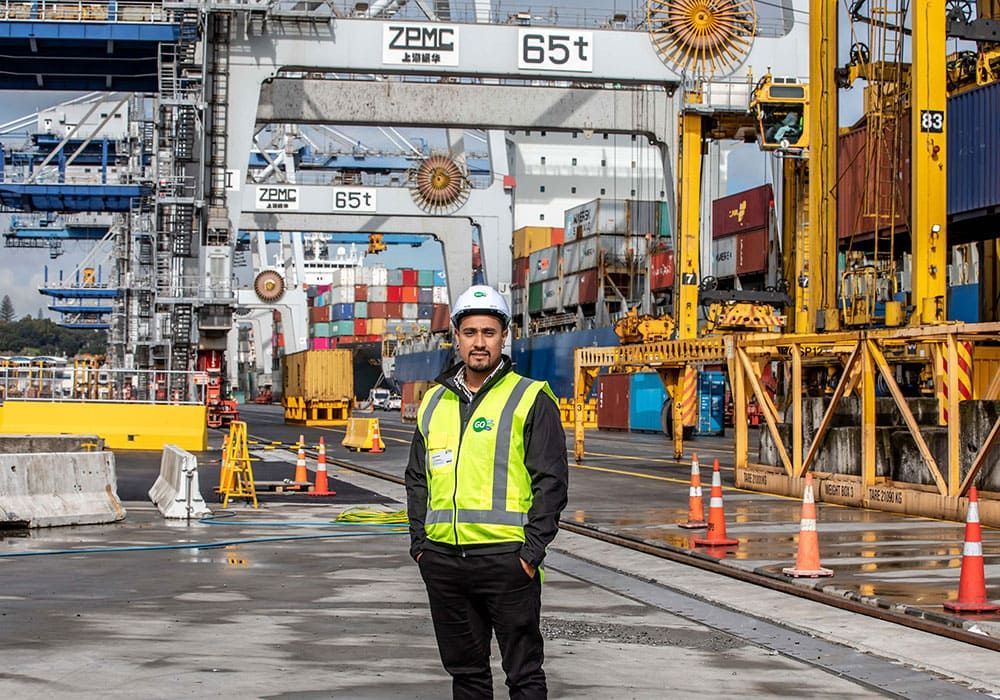GO worker at shipping container dock