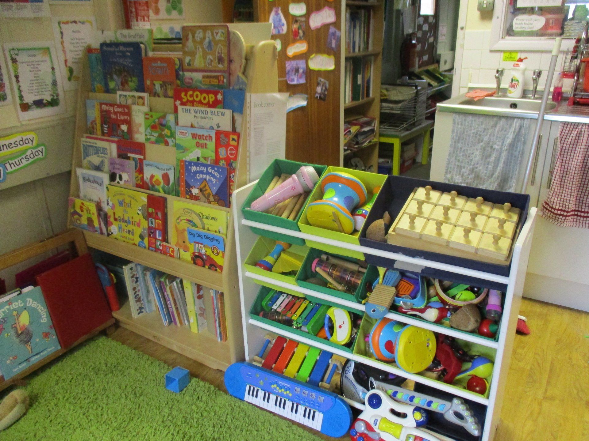 A room filled with lots of toys and books.