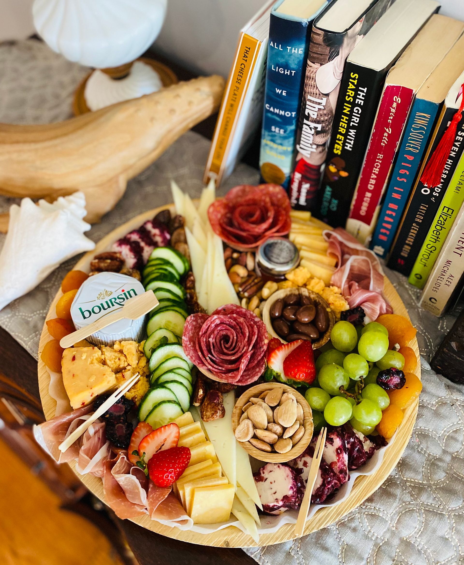 a plate of food with bourgeois cheese on it