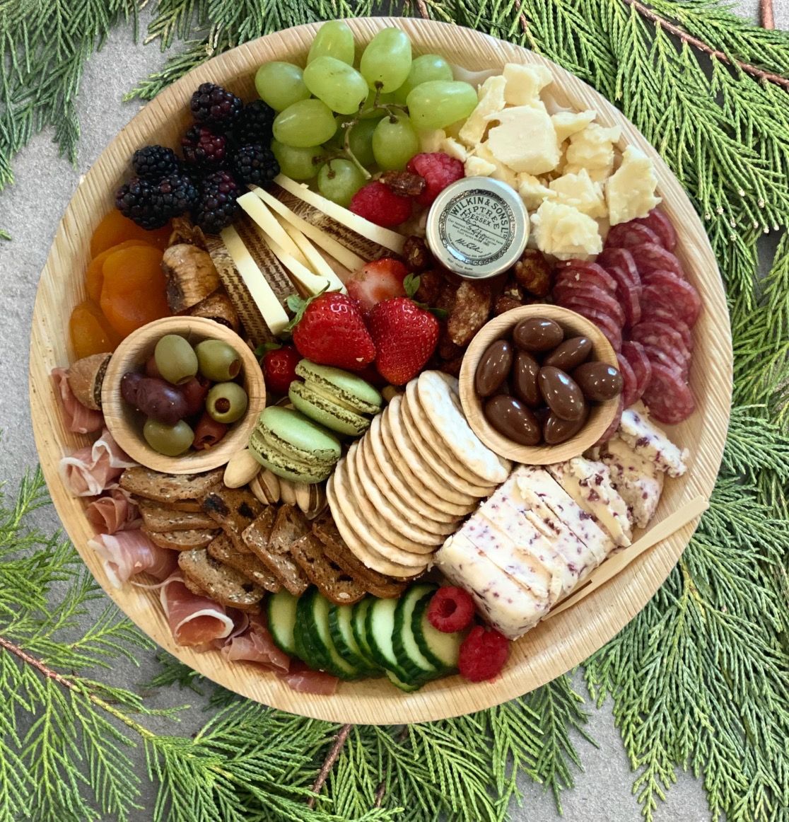 a plate of food with a jar of mustard on it