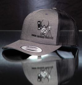 Gray and black trucker hat with an embroidered logo and the words "DARK ENERGY EMPIRE".