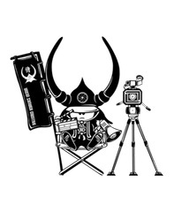 Cartoon samurai in director's chair, holding clapperboard and megaphone, with banner and video camera on tripod.