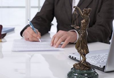 Lawyer Signing in Important Document - Estate Attorney in Dunkirk, MD