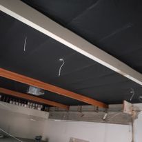 A blackboard with a question mark on it in a kitchen.