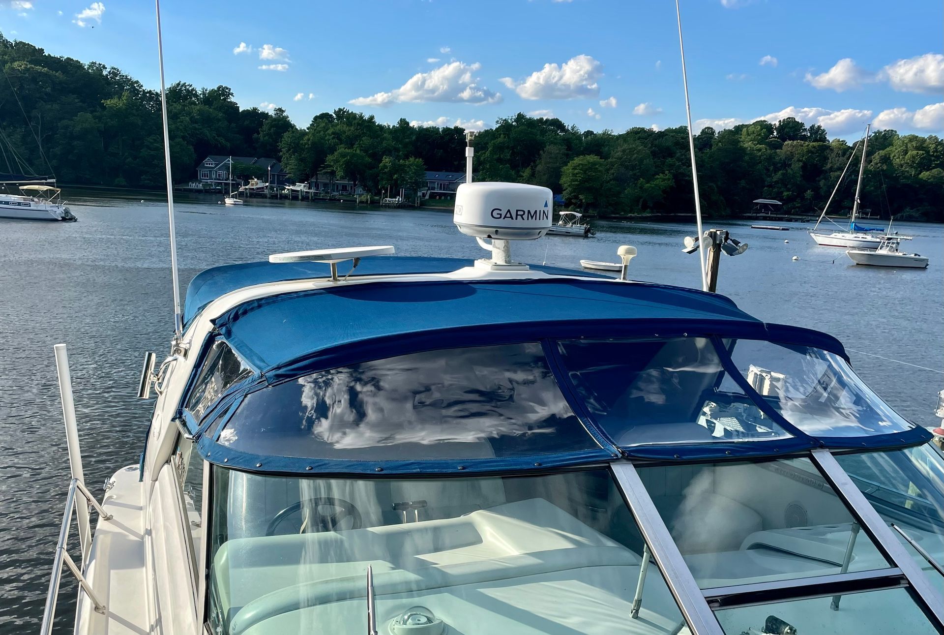 A boat with a garmin antenna on top of it | Cordova & Pasadena, MD | Shoreline Awning & Trim