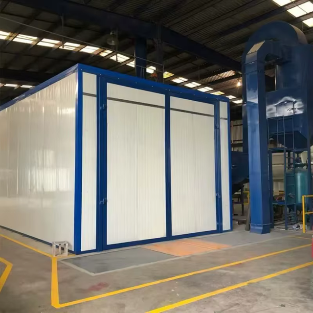 A large blue and white building in a factory
