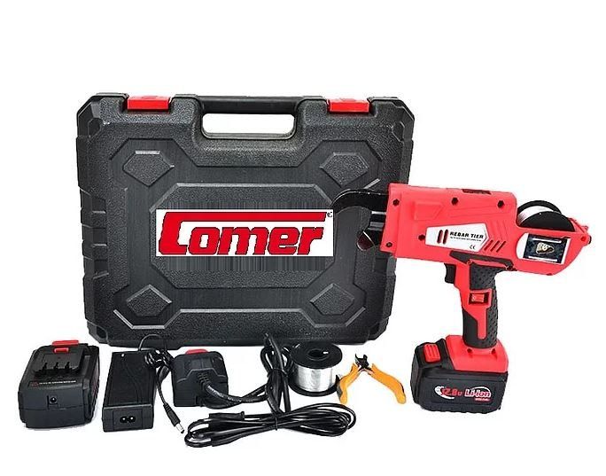 In una custodia è presente uno strumento cordless rosso e nero.