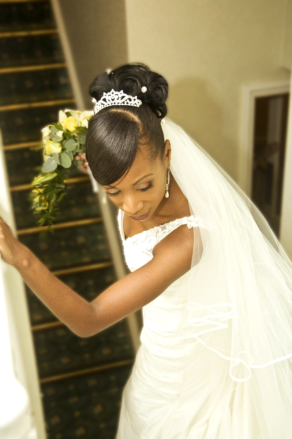 Bridal hair updo styles, afro caribbean wedding hair makeup in london.