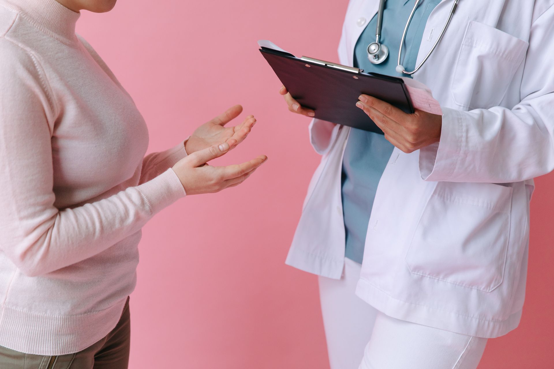 woman consulting doctor on side effects of copper iud