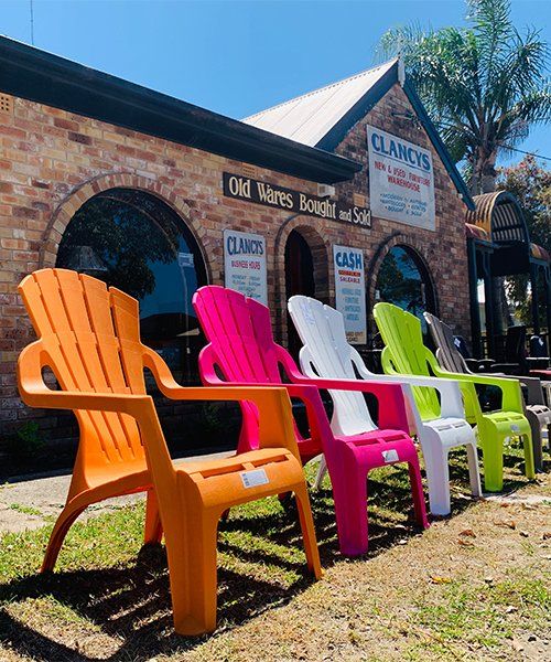 Colorful Chairs Display In Store Front — Furniture Store in Taree NSW