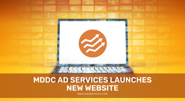 A laptop on a gold background with the text: MDDC AD SERVICES LAUNCHES NEW WEBSITE and the company logo on the screen.