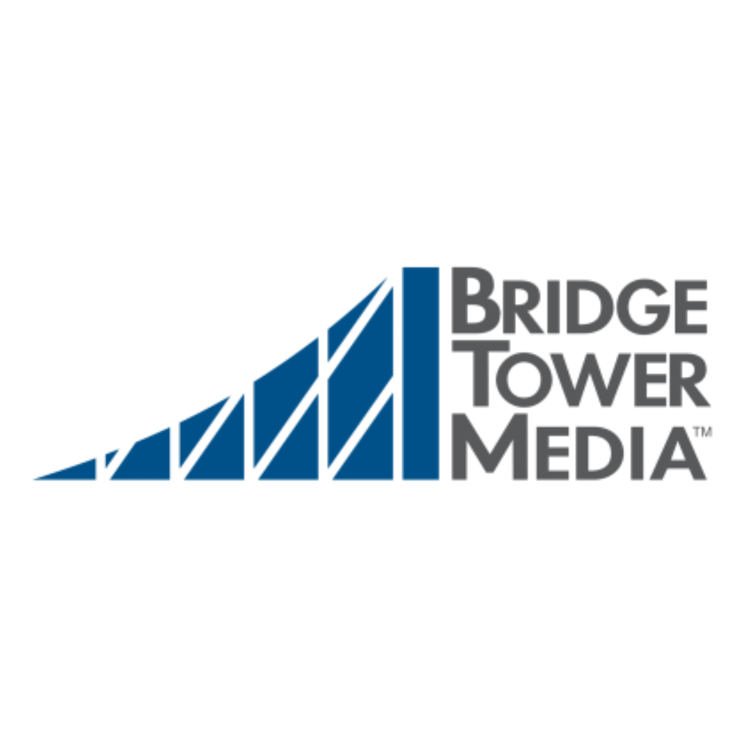 The Bridge Tower Media logo: a blue, triangular graphic resembling a stylized bridge next to the brand name in grey text.