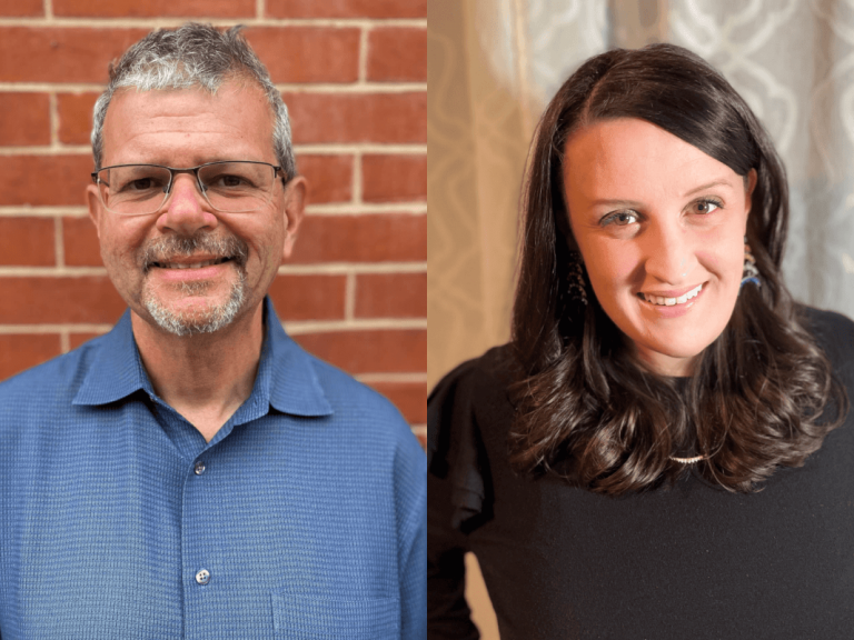 Two people: a person with glasses against a brick wall, and a person with long dark hair against a neutral curtain.