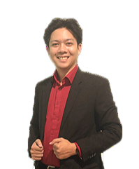 A smiling person in a red button-down shirt and black suit jacket, standing against a plain white background.