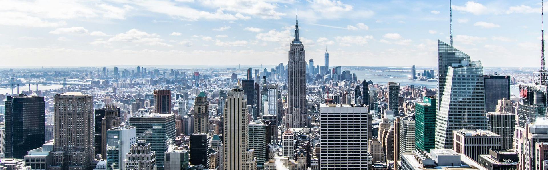 pictures of buildings in New York City signify the shift to accounting outsourcing