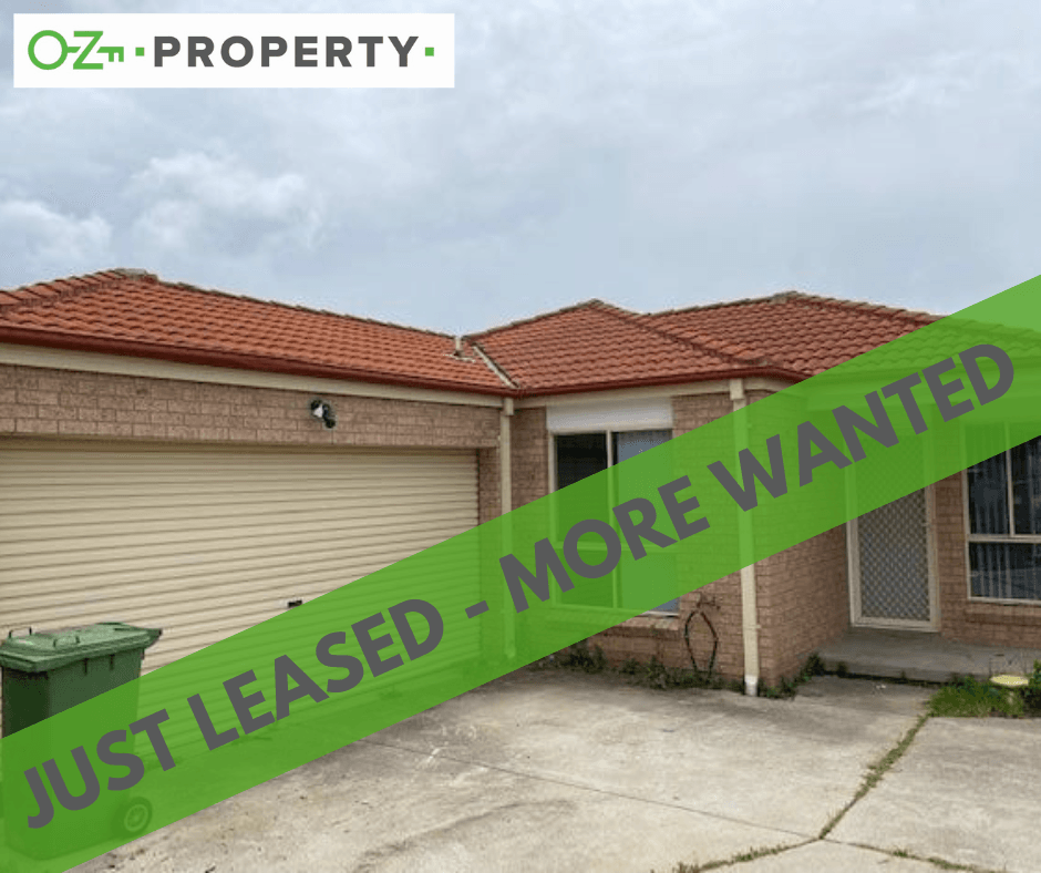 A house with a green banner that says just leased more wanted