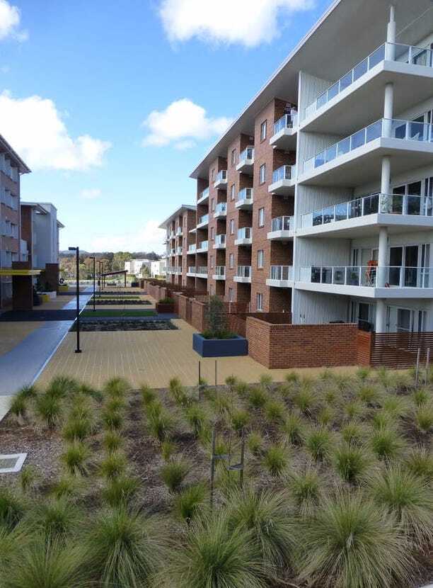 A large apartment building with a lot of balconies