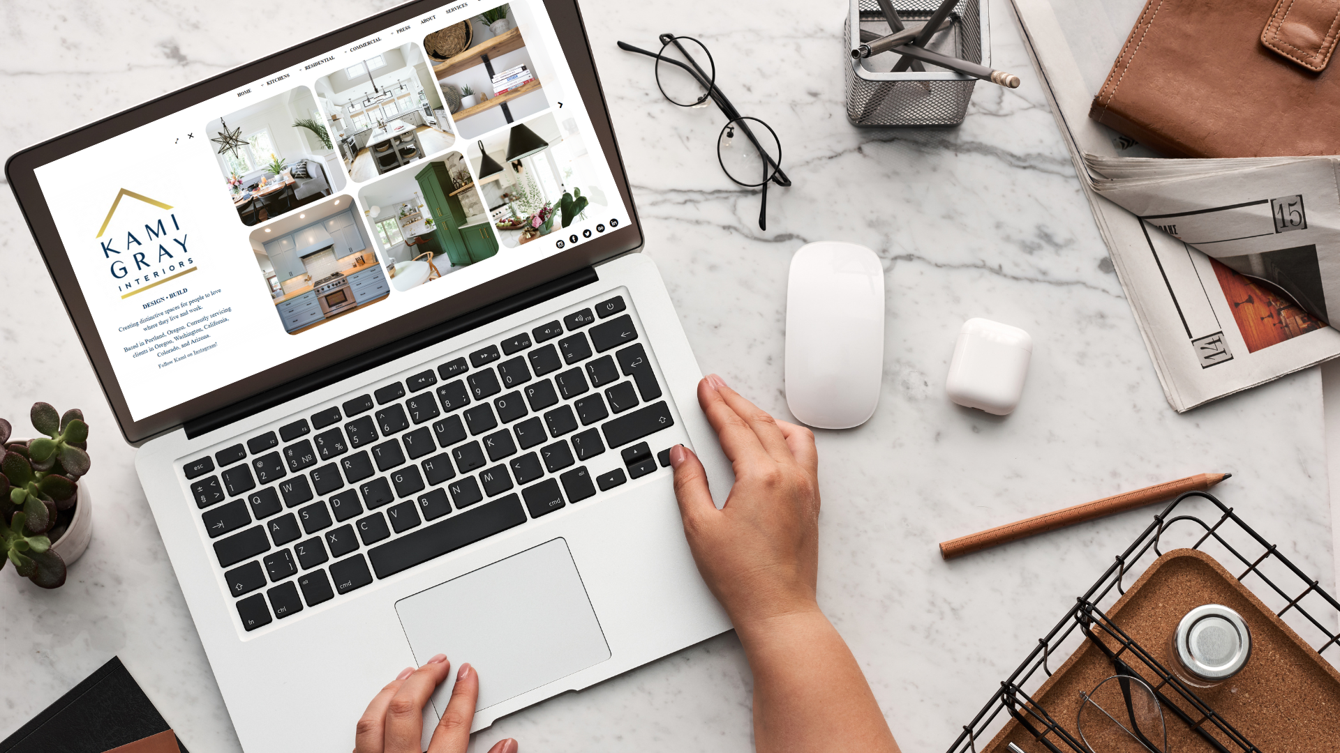 A person is using a laptop computer on a table.