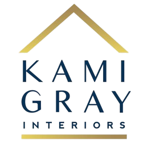 A blue and gold logo for kami gray interiors