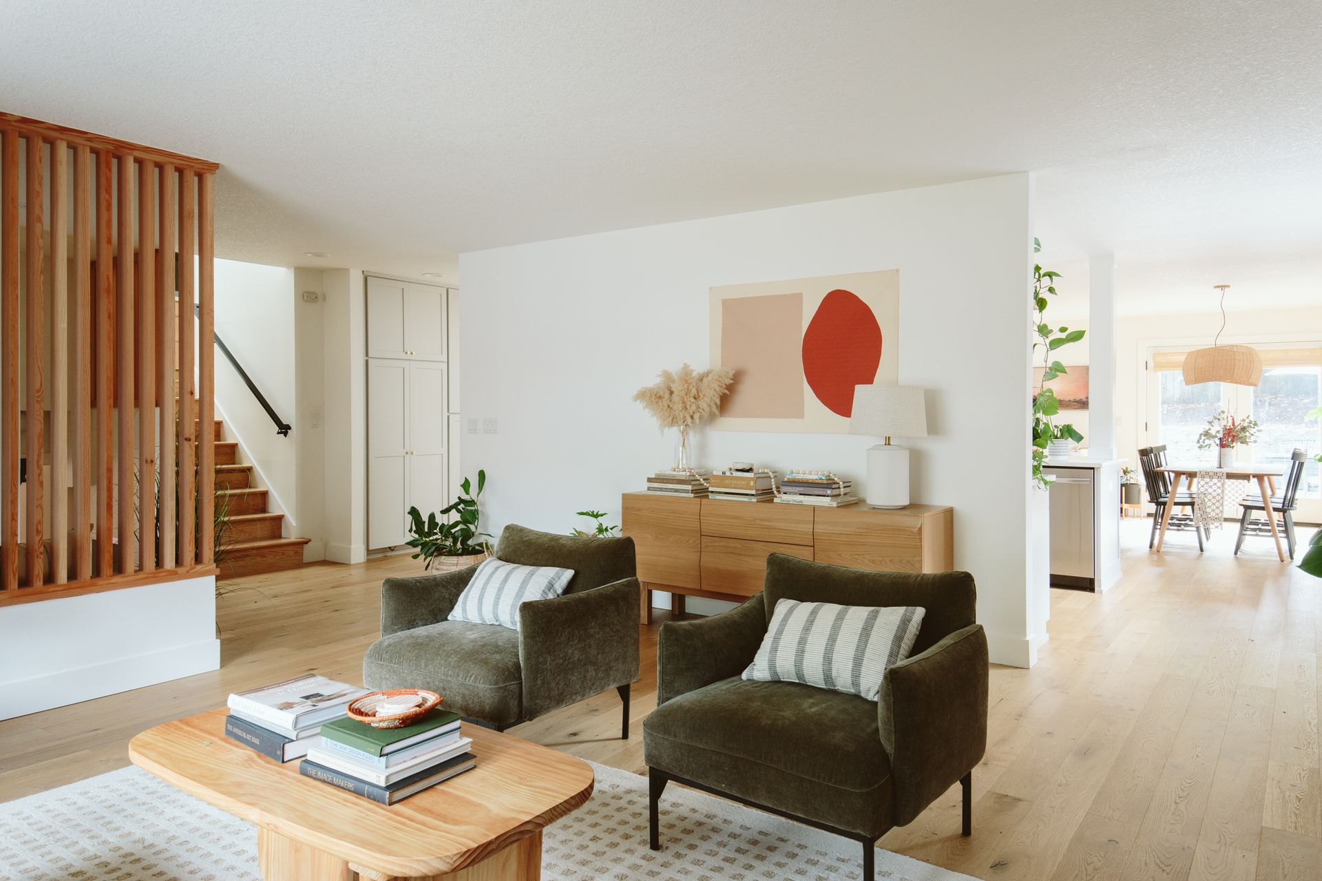 A living room with two chairs and a coffee table.