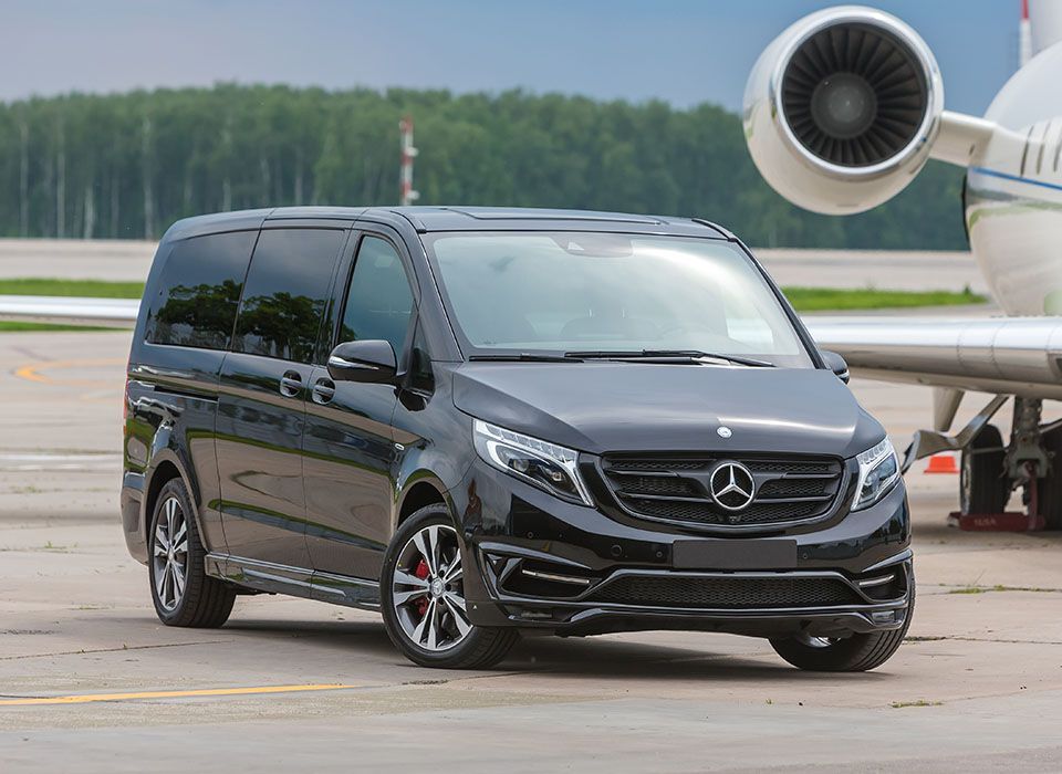 Private minivan service arriving at Athens Airport for group transfer to athens city.