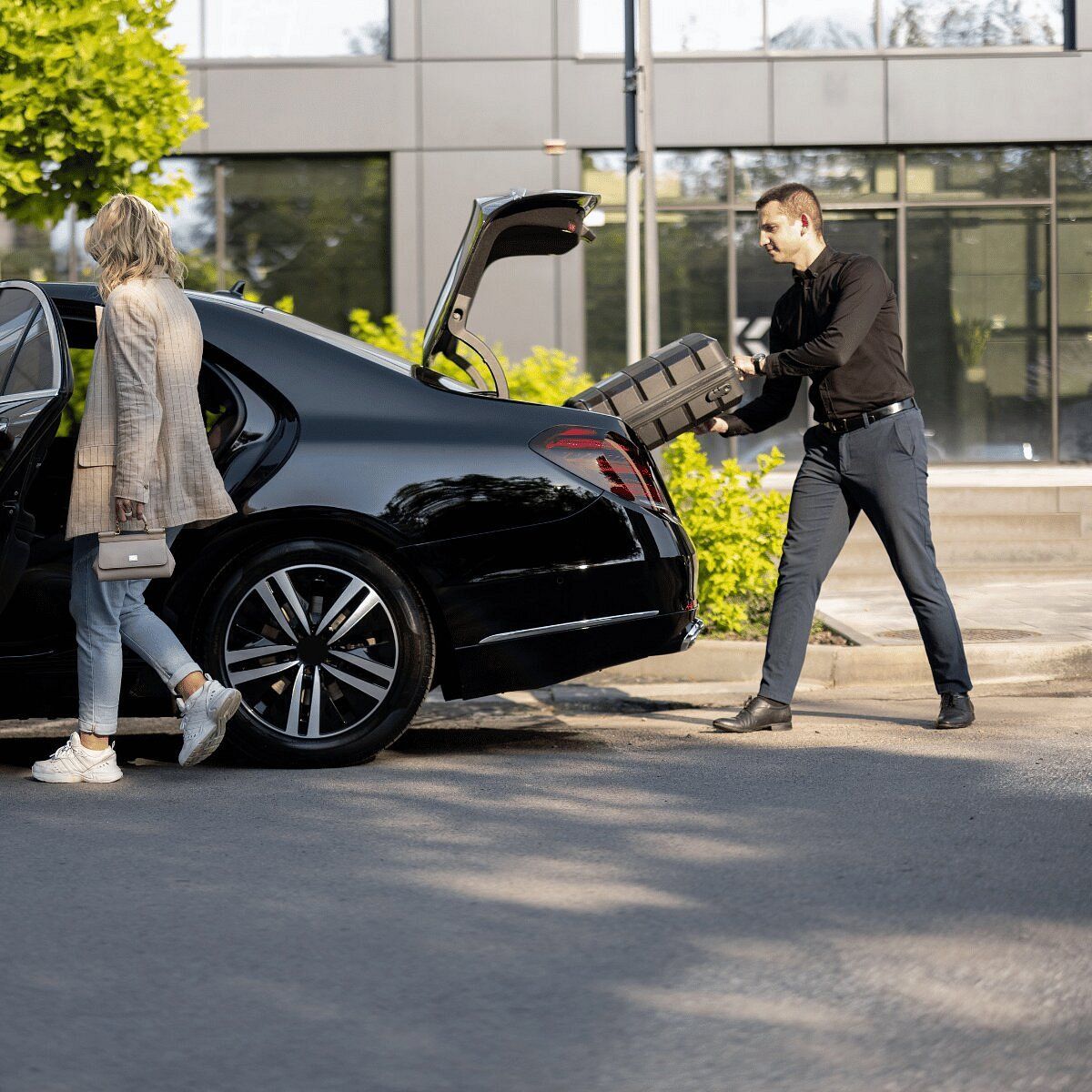 Luxury transfer from Athens Airport to Athens City, featuring a premium vehicle and iconic city landmarks