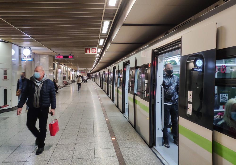 Metro Line 3 from Athens Airport to the city, showing a train with metro stations and city landmarks along the route