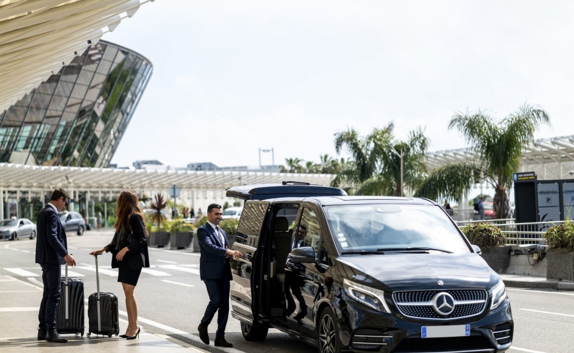 Passengers exiting Athens International Airport, ready for a city transfer