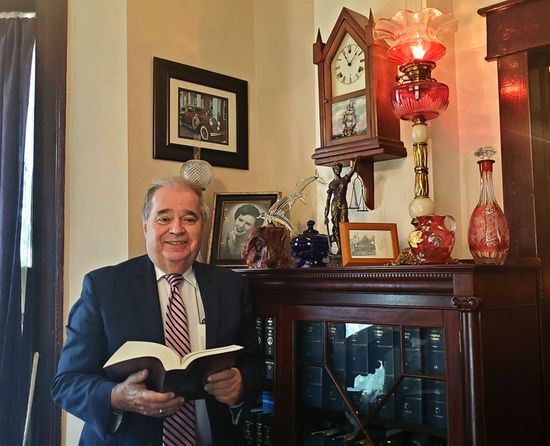 Rodger L. Smith Holding Book In His Office — Luray, VA — Rodger L. Smith, Counselor at Law, PC