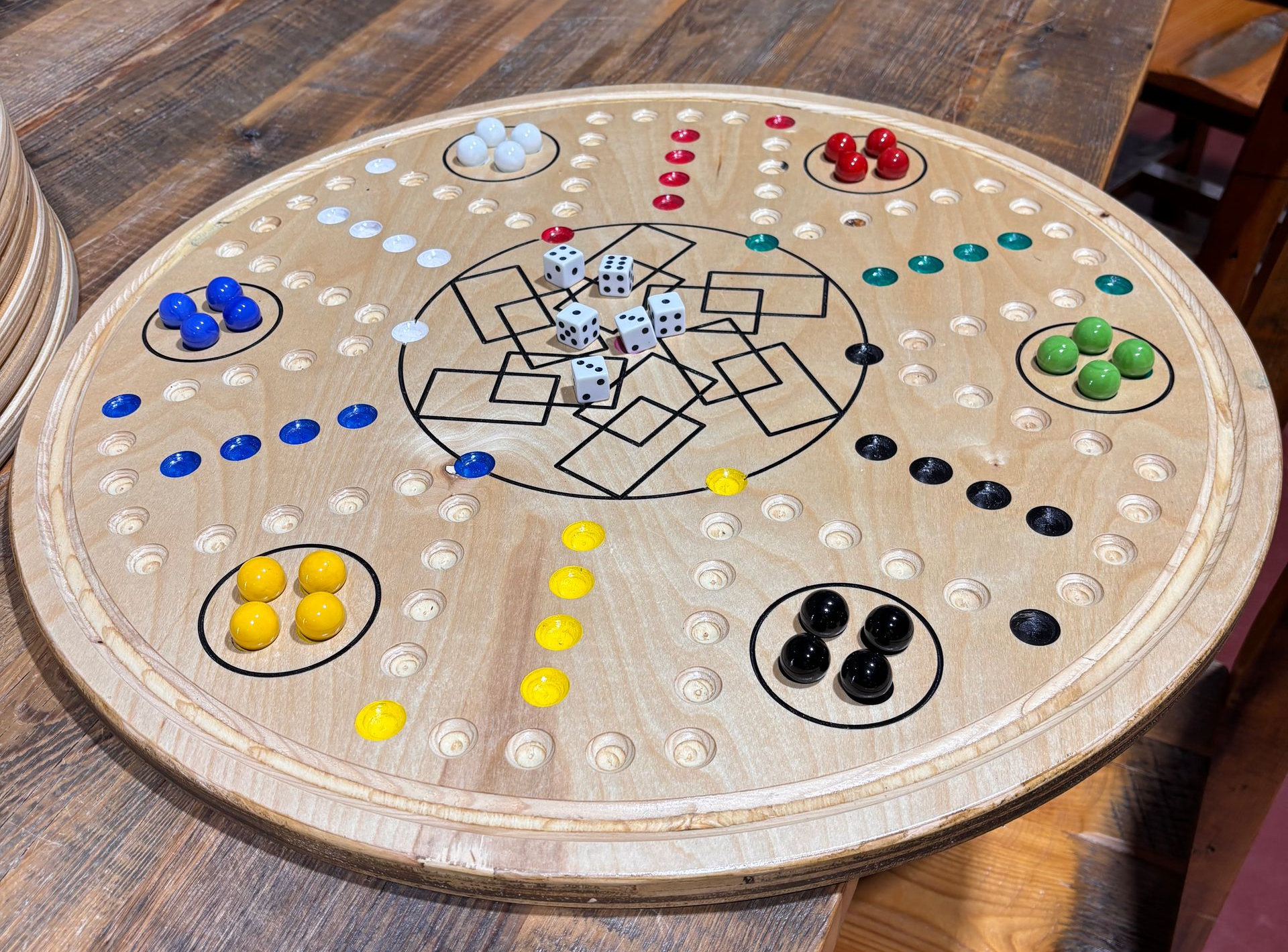 Wahoo Board.  Fun board game for all ages.  Using 3/4 inch marble set with 6 different colors and one die provided.  Play singles or as teams.  Let's the games begin!  Online Store with shipping or pickup in Hutchinson, KS
