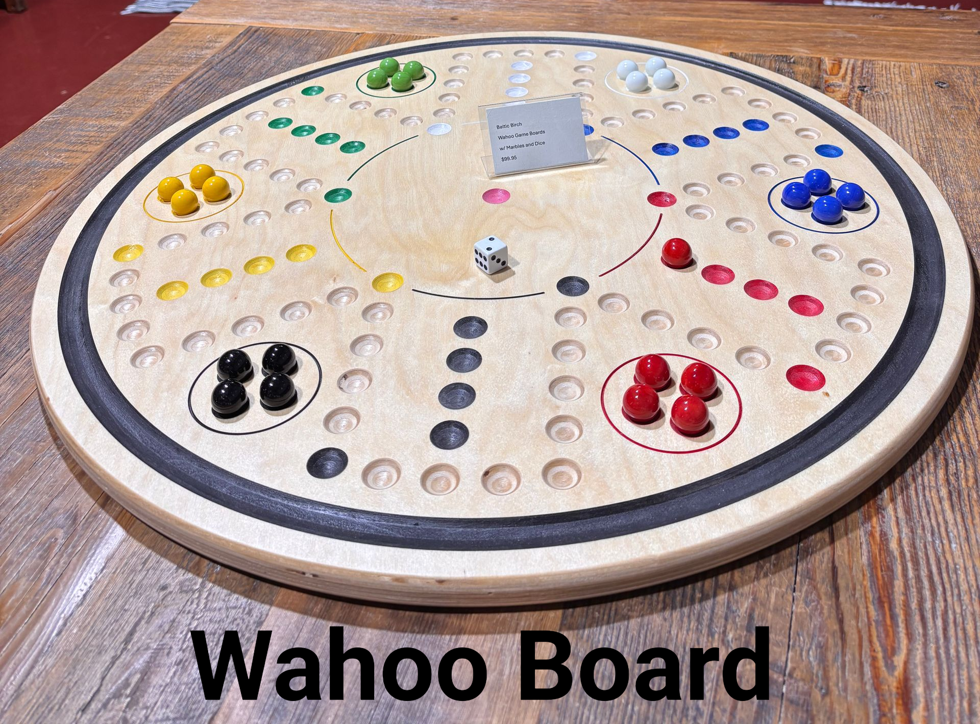 Wahoo Board.  Fun board game for all ages.  Using 3/4 inch marble set with 6 different colors and one die provided.  Play singles or as teams.  Let's the games begin!  Online Store with shipping or pickup in Hutchinson, KS
