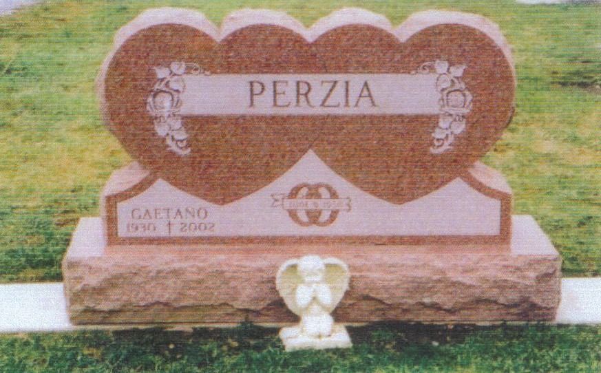 Heart-shaped headstone in a cemetery with 