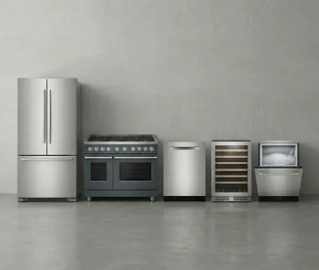 A stainless steel refrigerator, range, dishwasher, wine cooler, and ice maker lined up against a plain concrete wall.