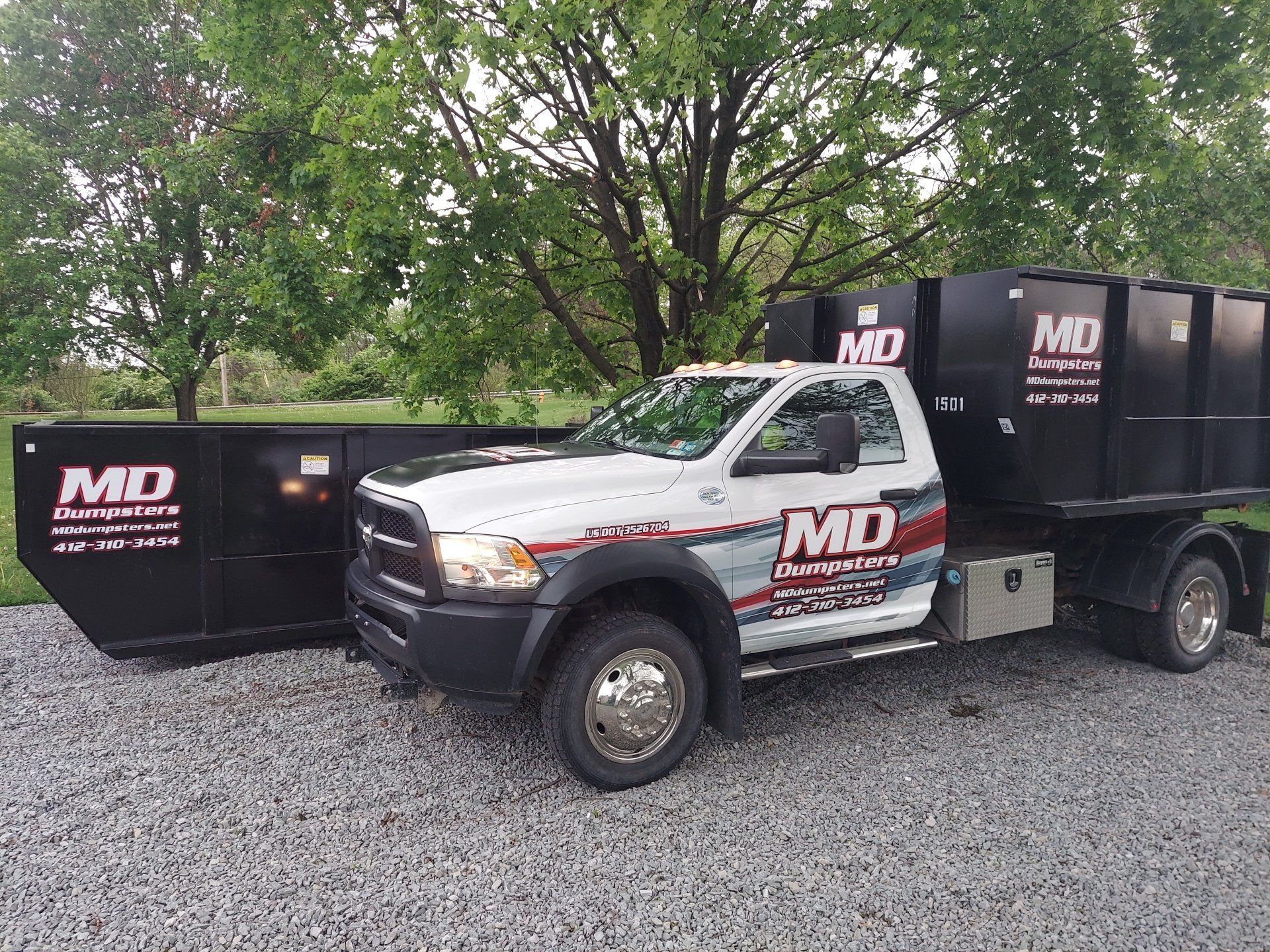 A construction dumpster rental in use in Pittsburgh, PA