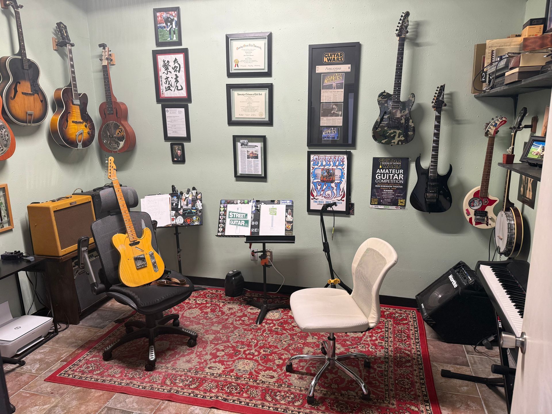 Private guitar lesson studio with electric and acoustic guitars at Little Rock Music Academy