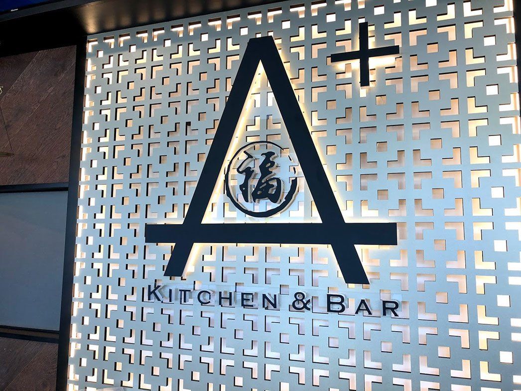 Signage On A Patterned Wall — Signage In Acacia Ridge, QLD