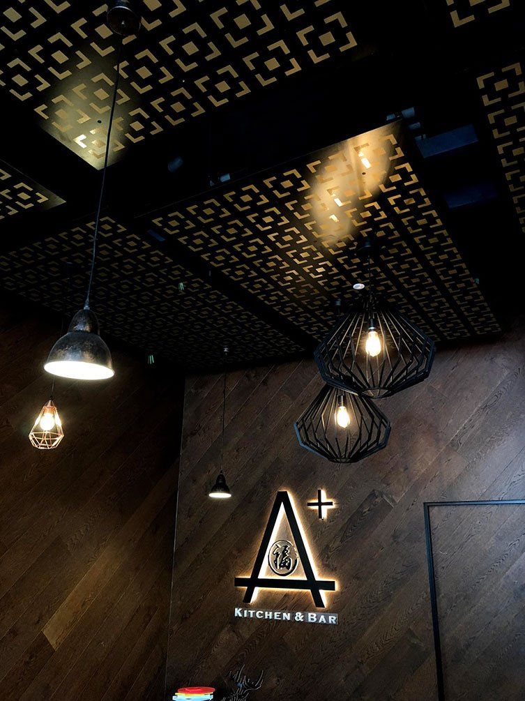 Backlight Logo Signage Inside A Store — Signage In Acacia Ridge, QLD